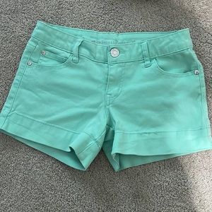 Teal stretchy shorts, size 5
